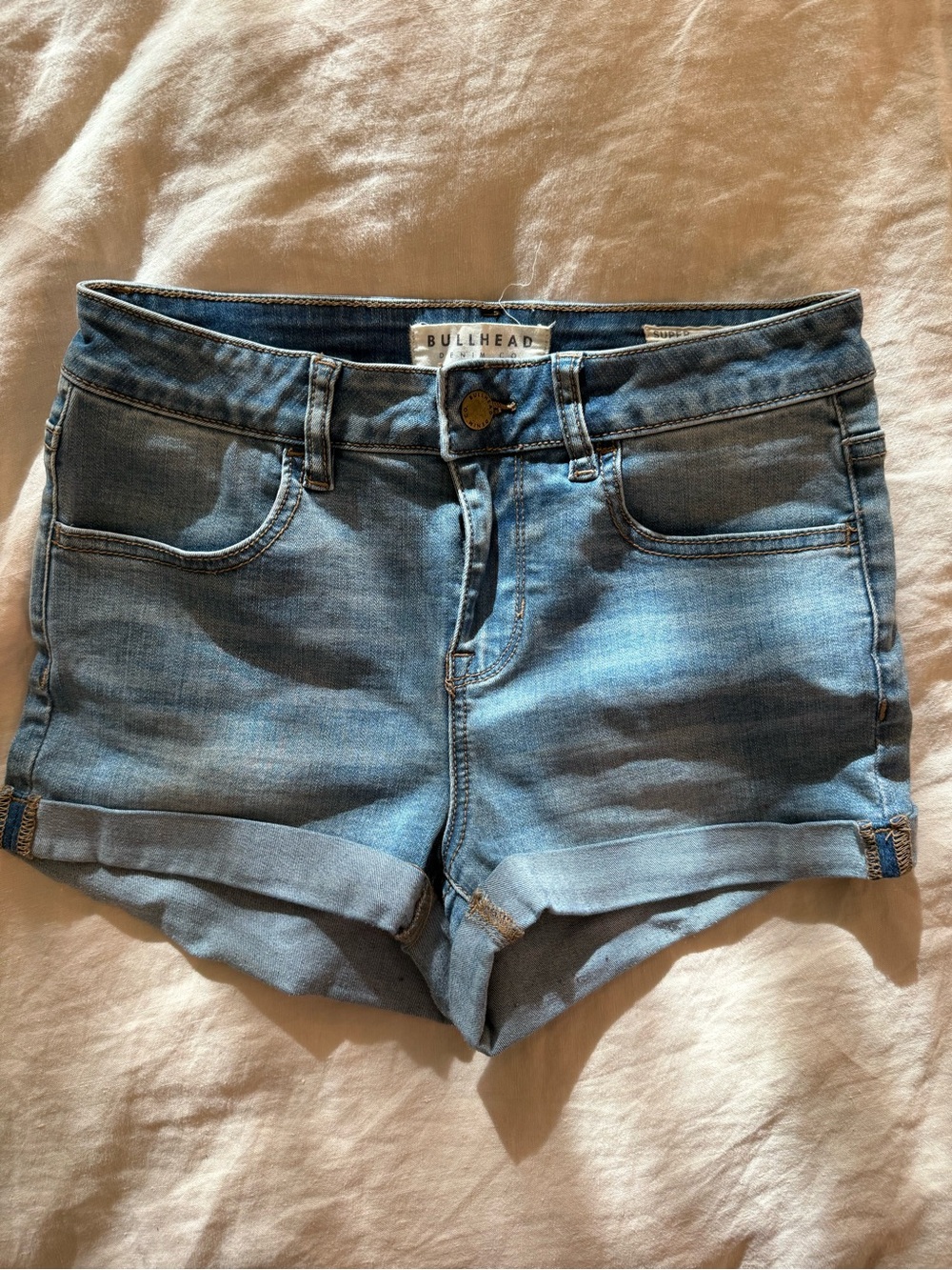 Bullhead Women's Light Wash Denim Roll-Cuff Shorts